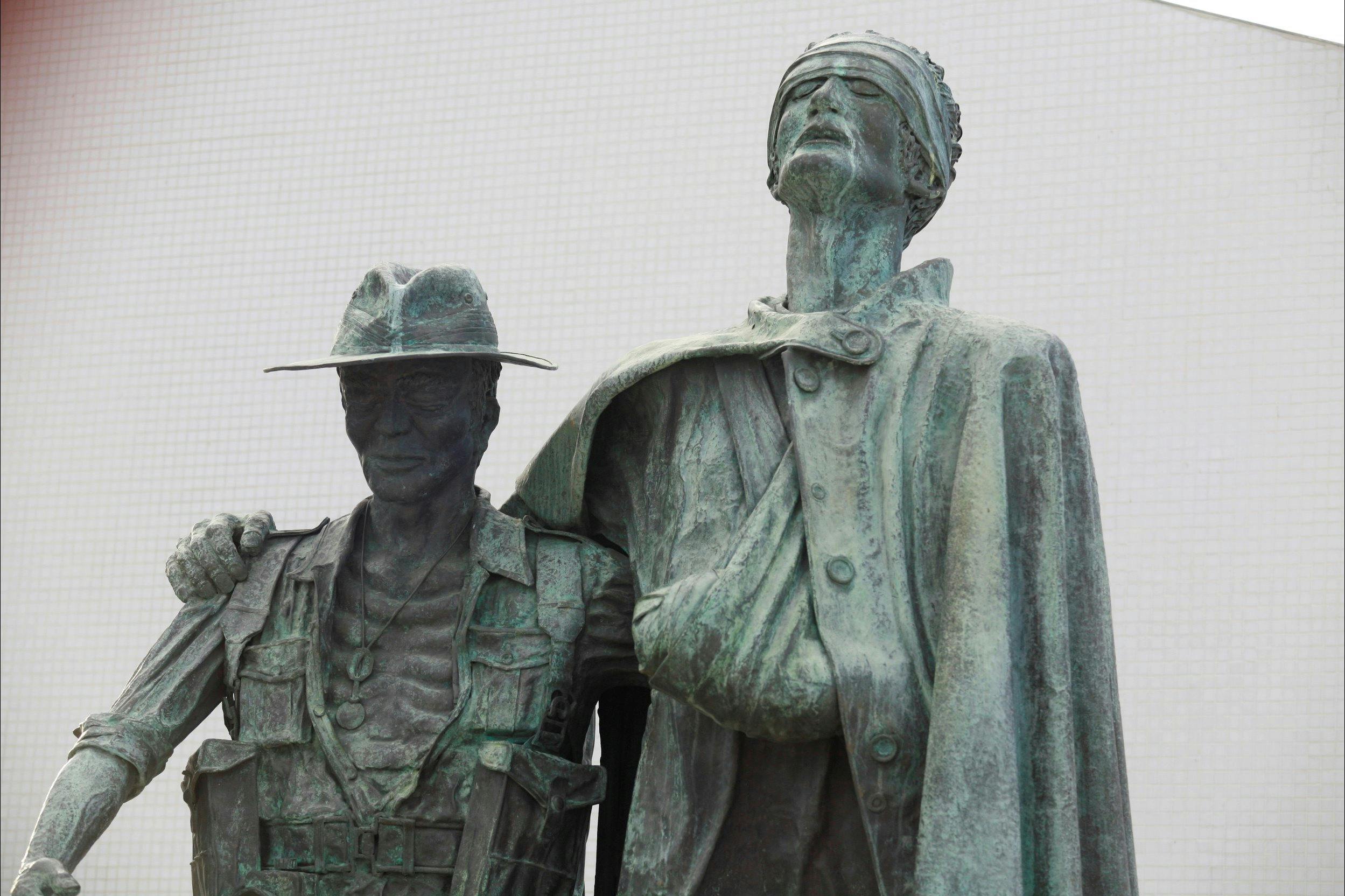 Mateship - Beaten copper by Bela Angyal, inspired by Damian Parer