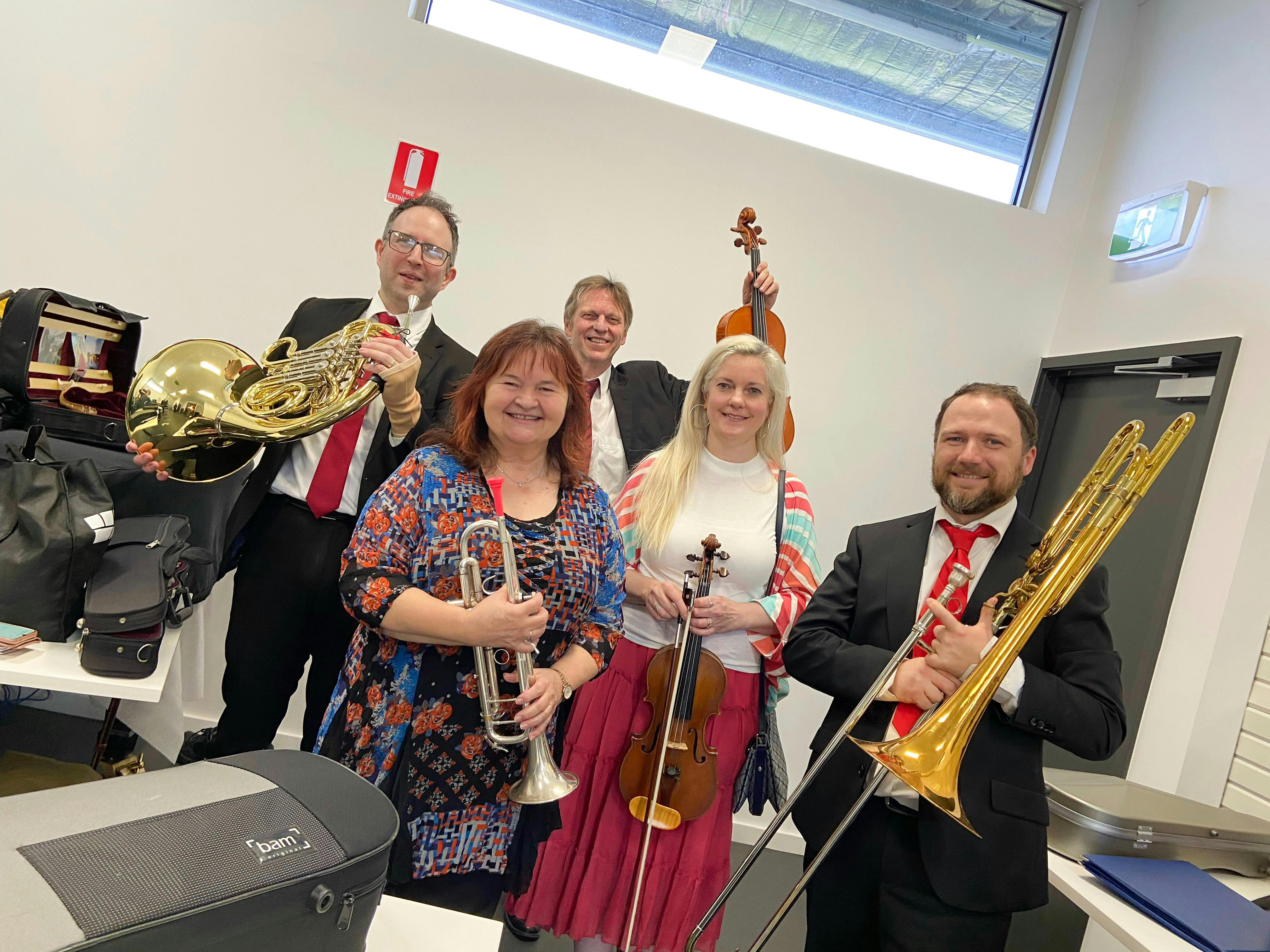 Members of the Victorian Concert Orchestra pictured backstage at The Rex