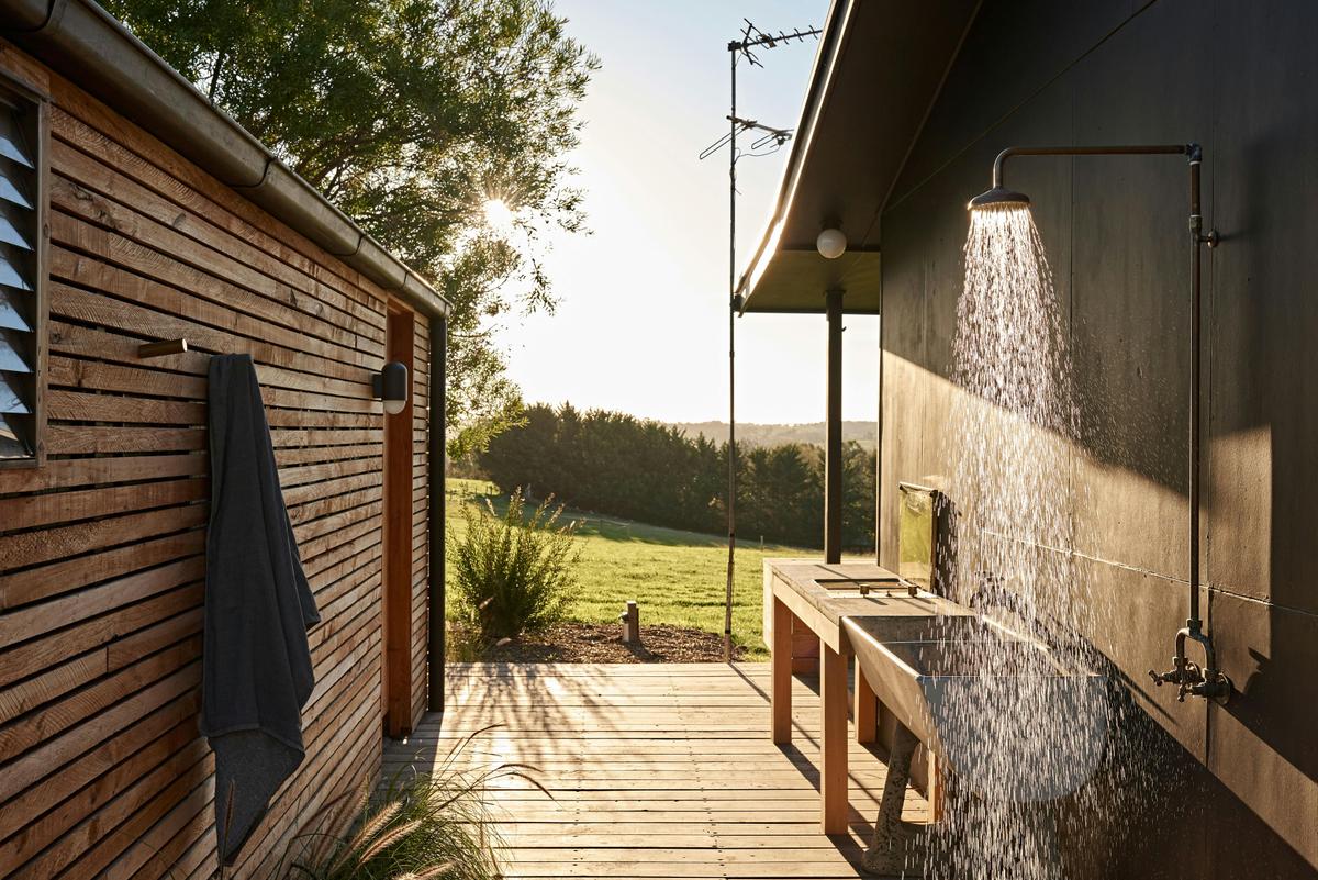 Outdoor shower and barbecue area