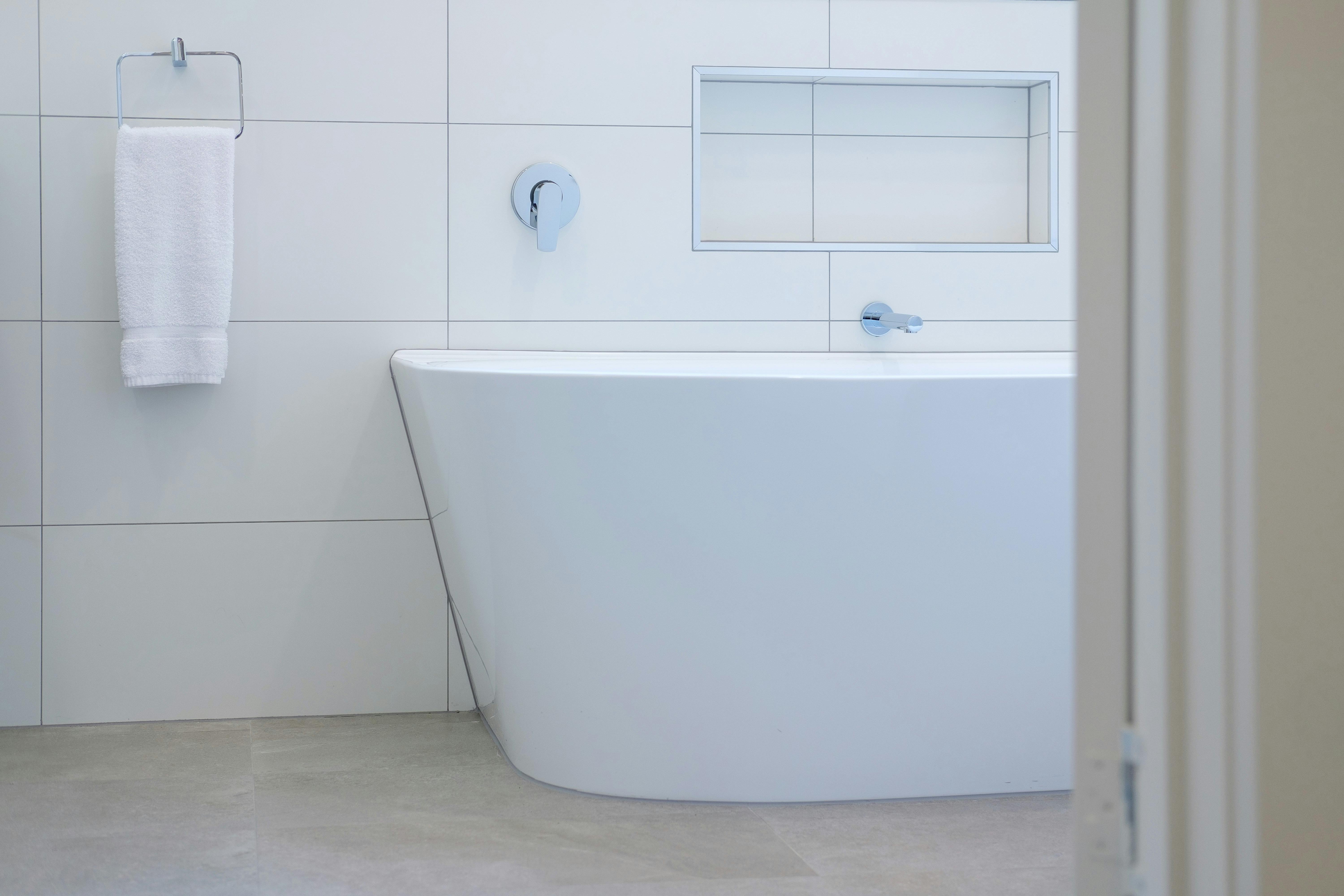 Full bathroom including luxurious bath.