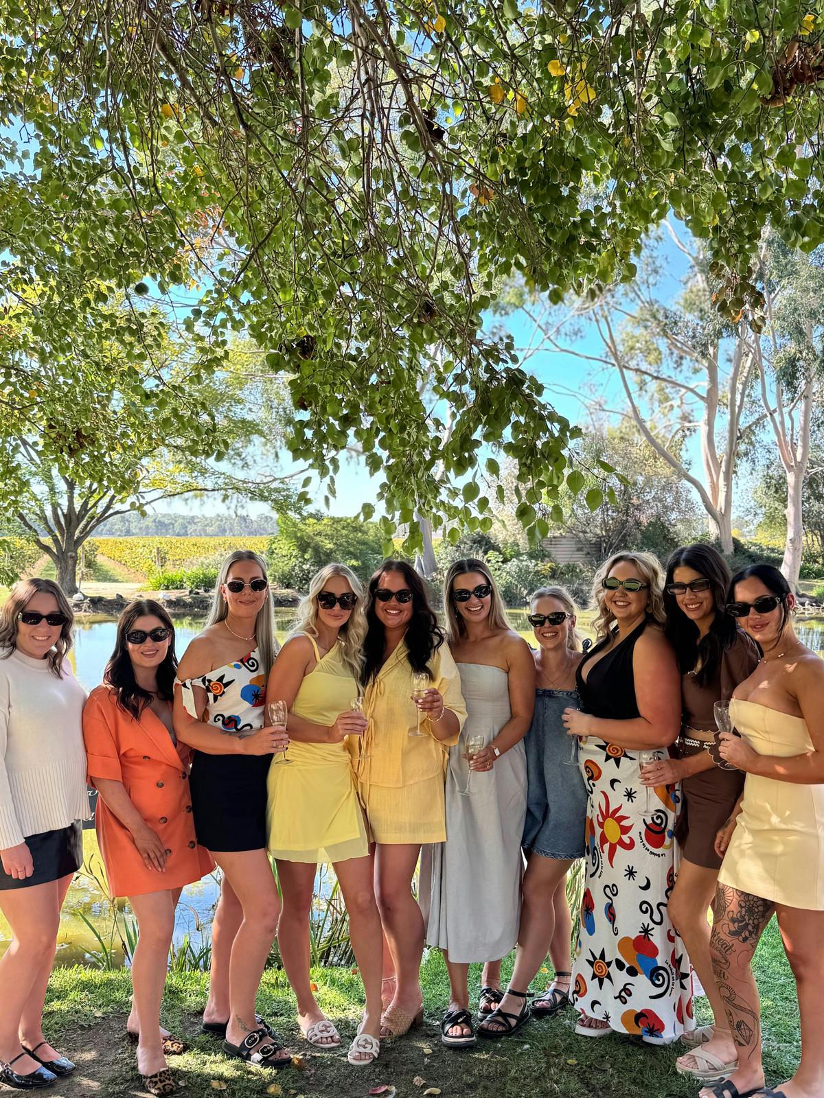 group of young woman standing for photo