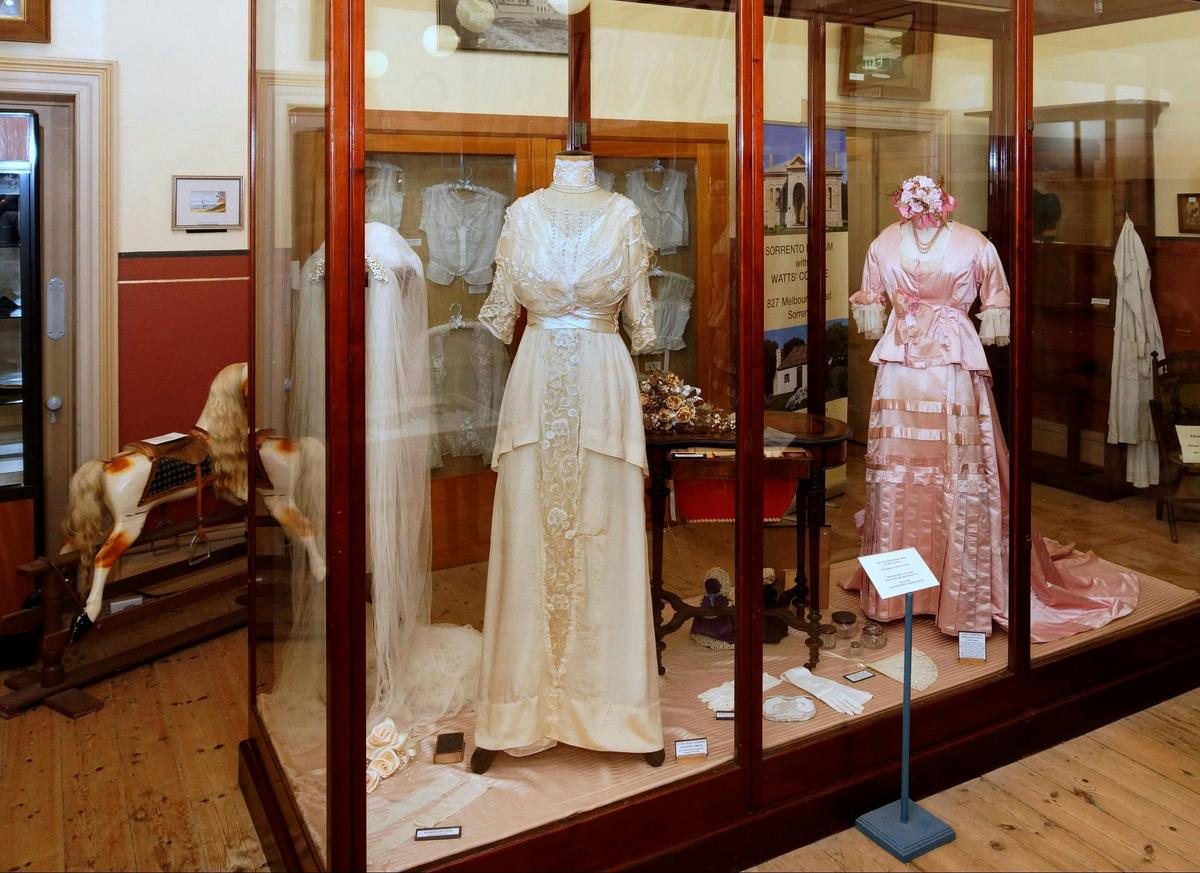 Beautiful ladies' long dresses, including a cream wedding dress