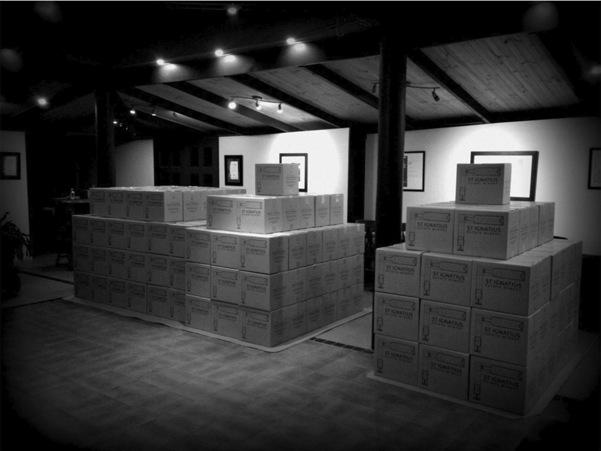 Wine cartons palletised on display room