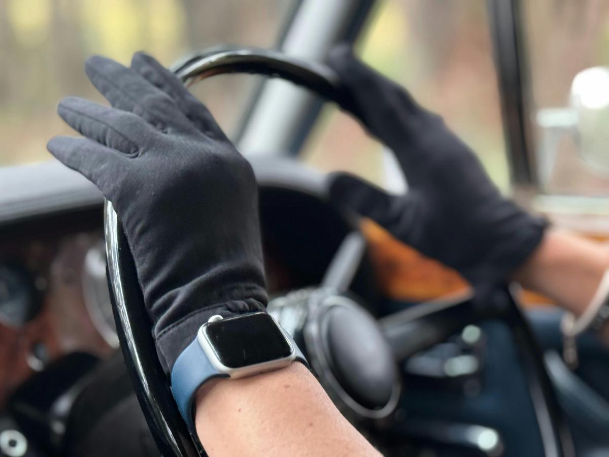 Silver Mink Tours_Black gloved Chauffeur drives guests in vintage Rolls Royce