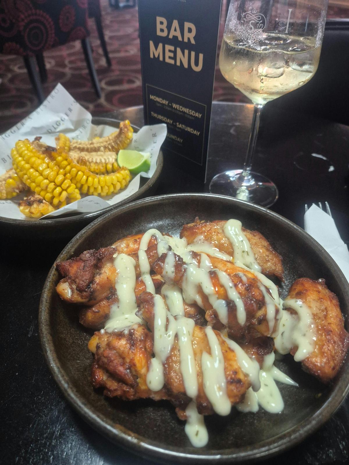 Chicken Buffalo Wings & Charred Corn Ribs - club favourites and available on main and bar menus