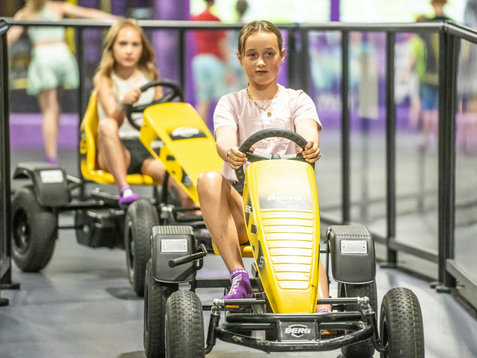 Kids on pedal cars