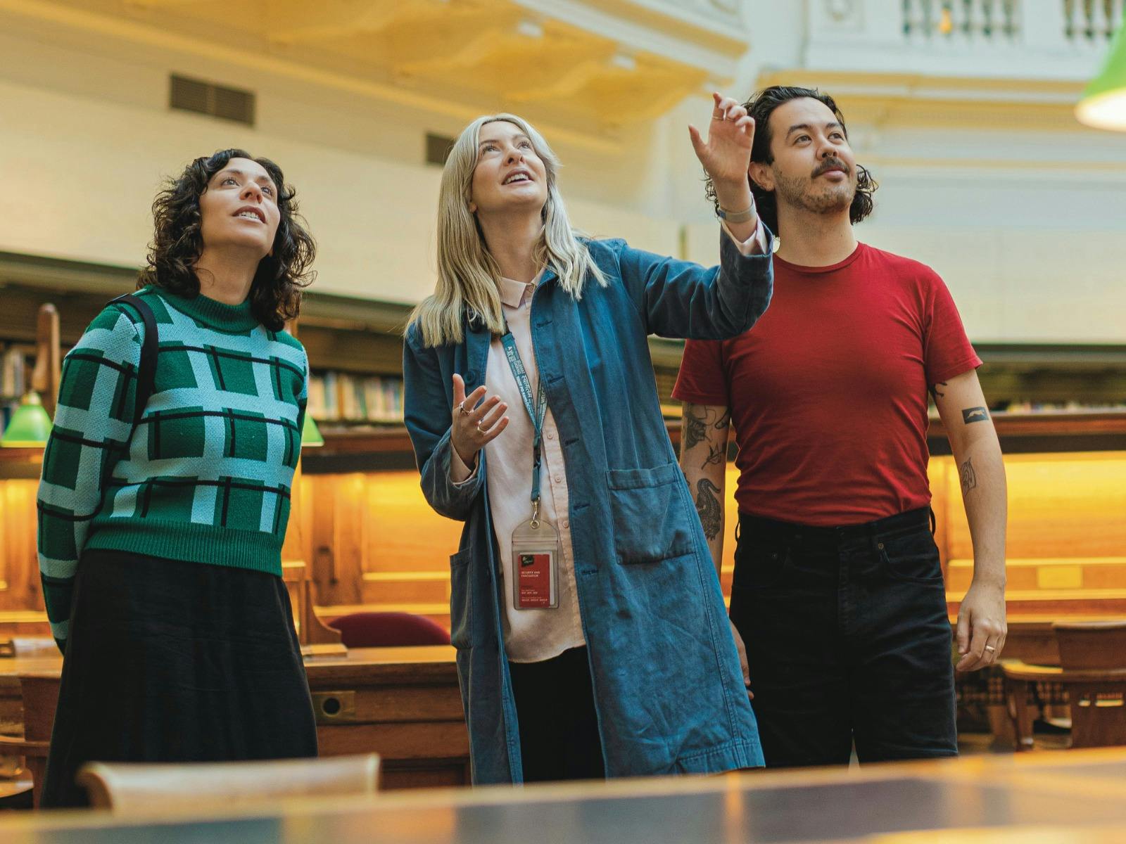 Two tour attendees listening to a guide in the Dome