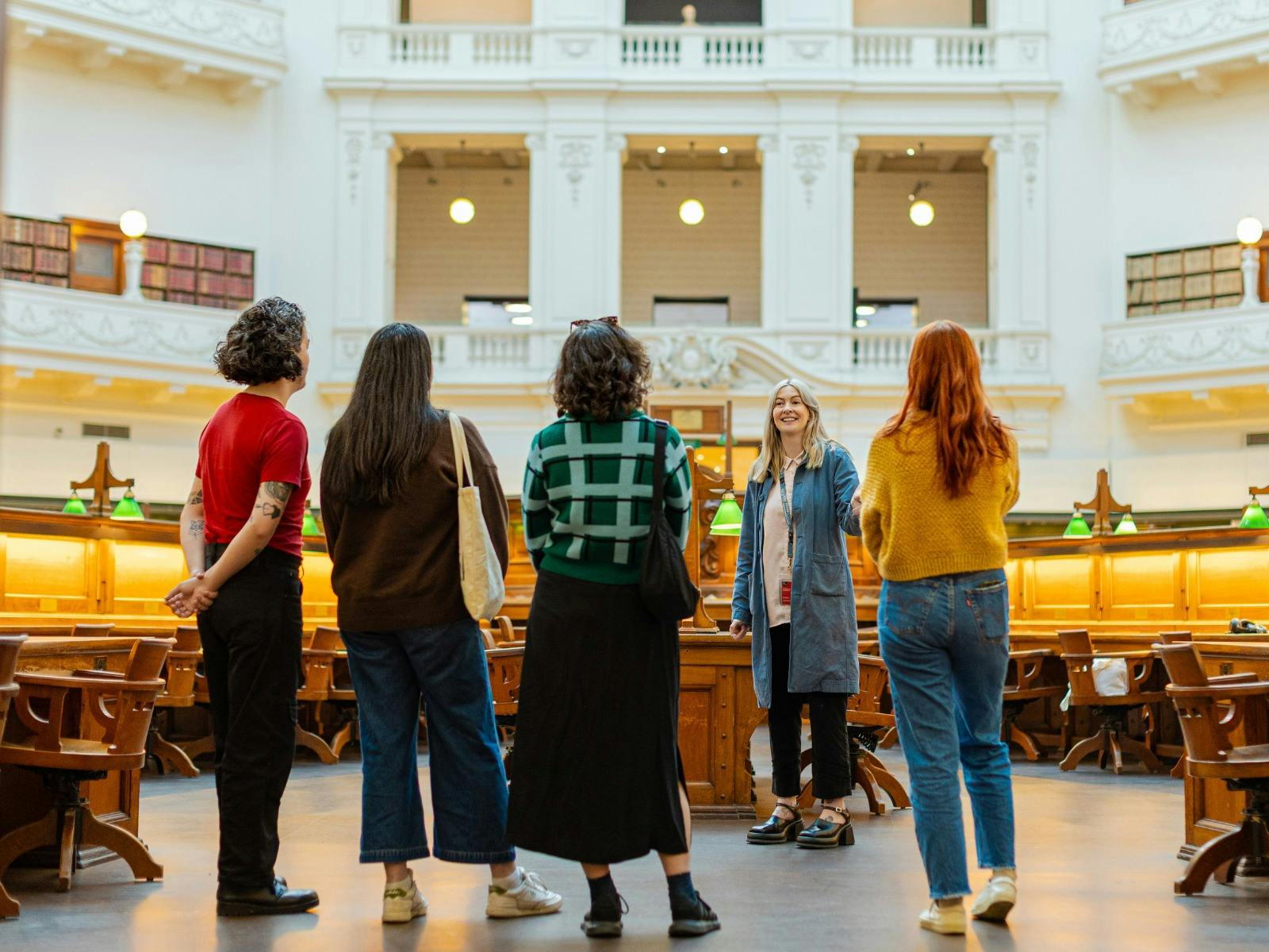 A tour group being led through the Library's Dome by a tour guide