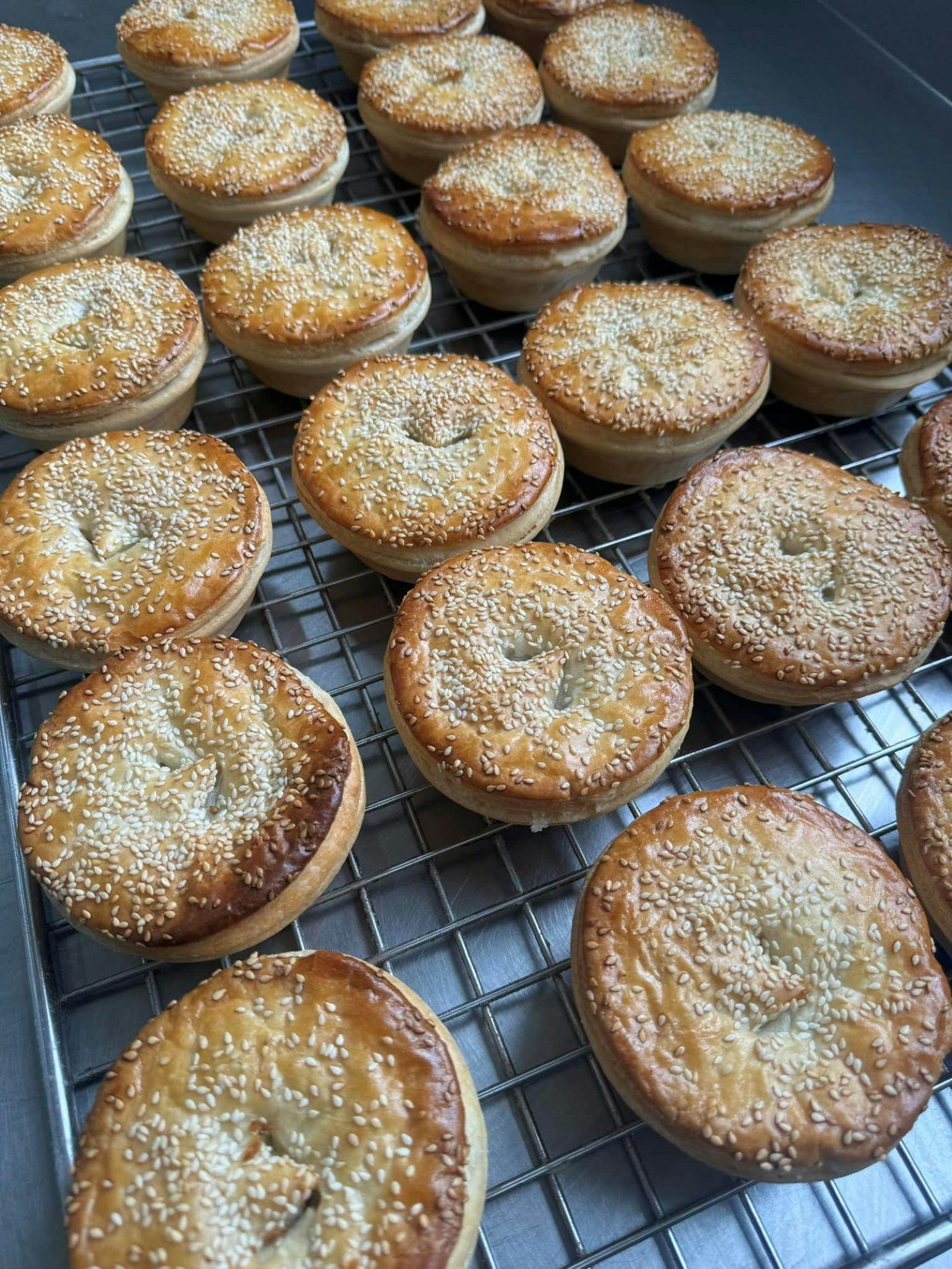 a tray of delicious home made pies