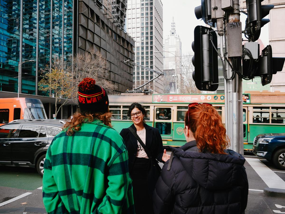 Local guide in Melbourne walking with group
