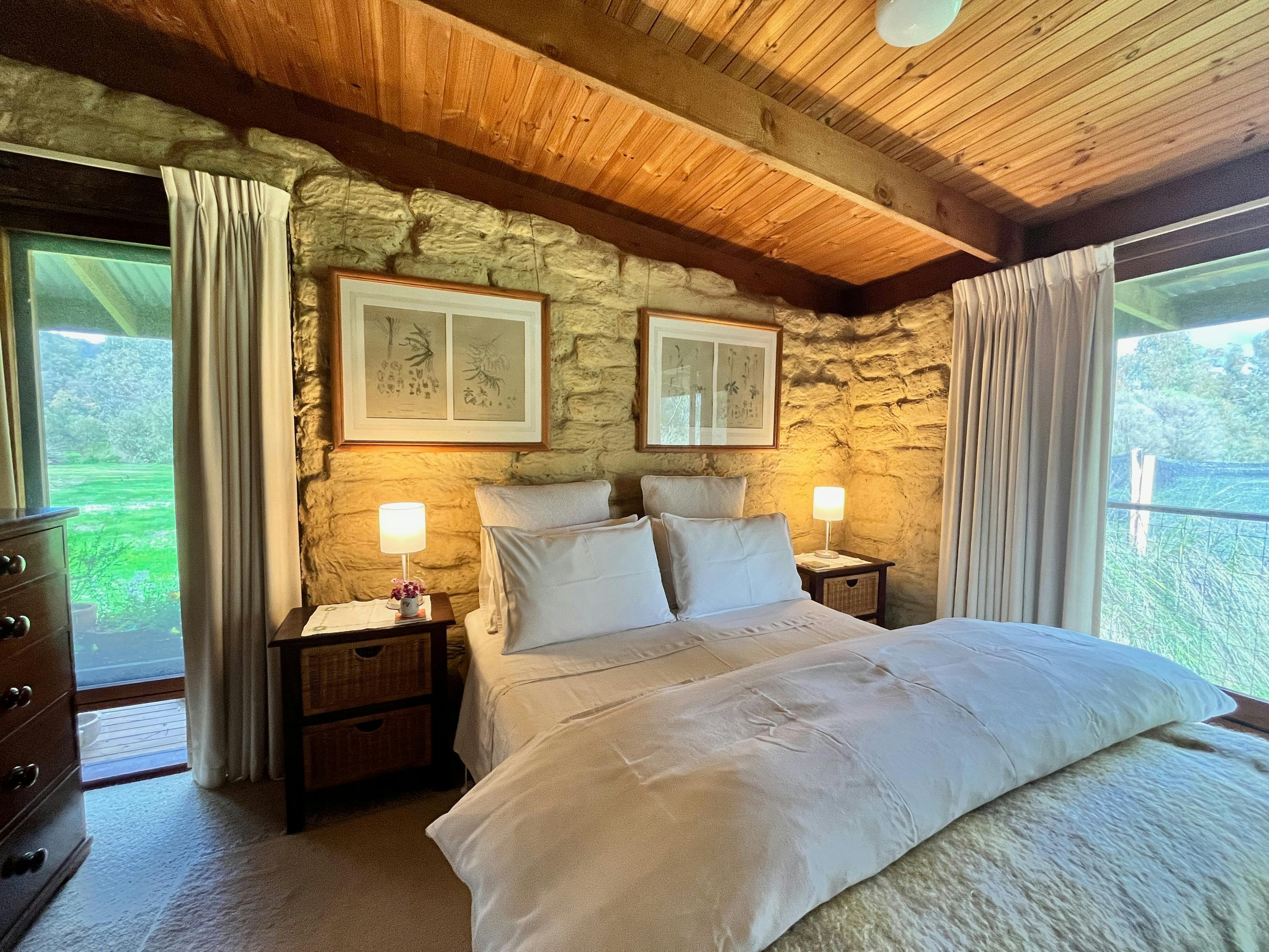 French linen on the bed at The Burrow at Wombat Bend