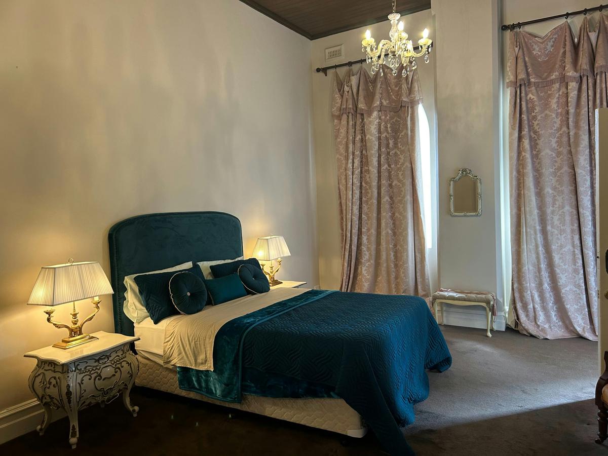 Sister Christina’s bedroom side view towards windows with view towards windows