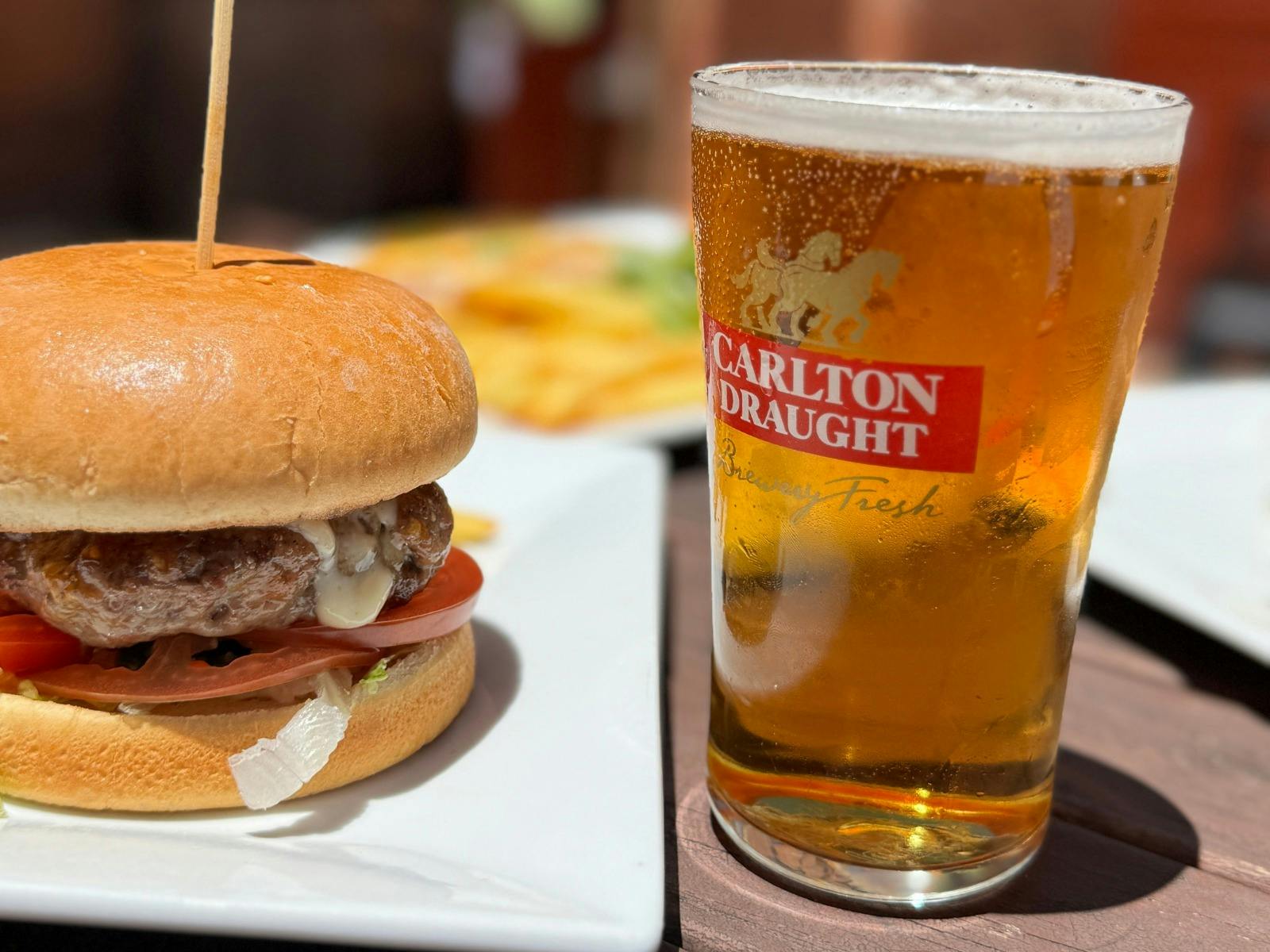 Pub burger and a glass of beer served at the Leopold Hotel.