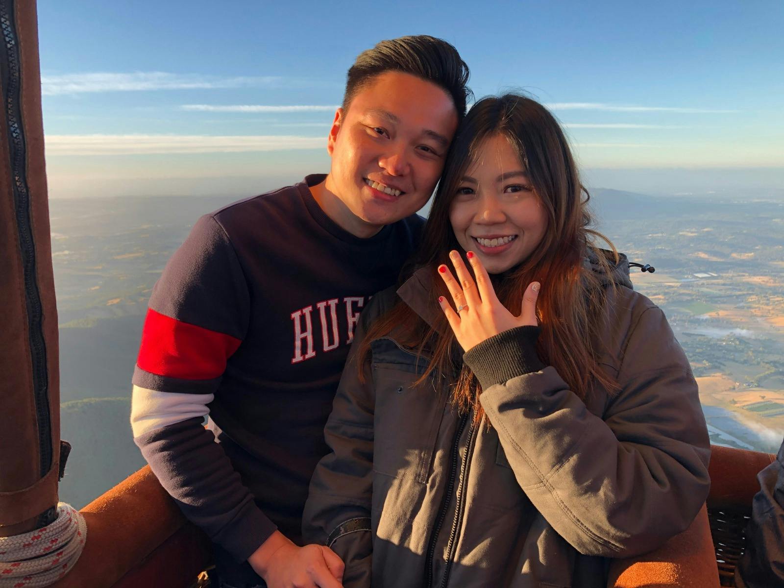 Romantic hot air balloon proposal over Geelong, capturing the newly engaged couple