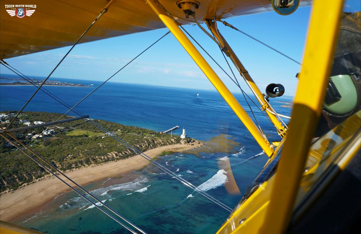 Flying toward Pt Lonsdale Lighthouse with Tiger Moth World