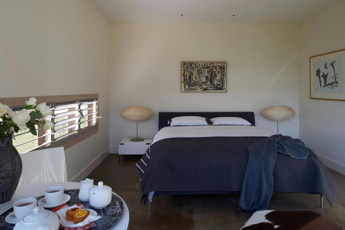 large bedrooms with beautiful linen and fixtures