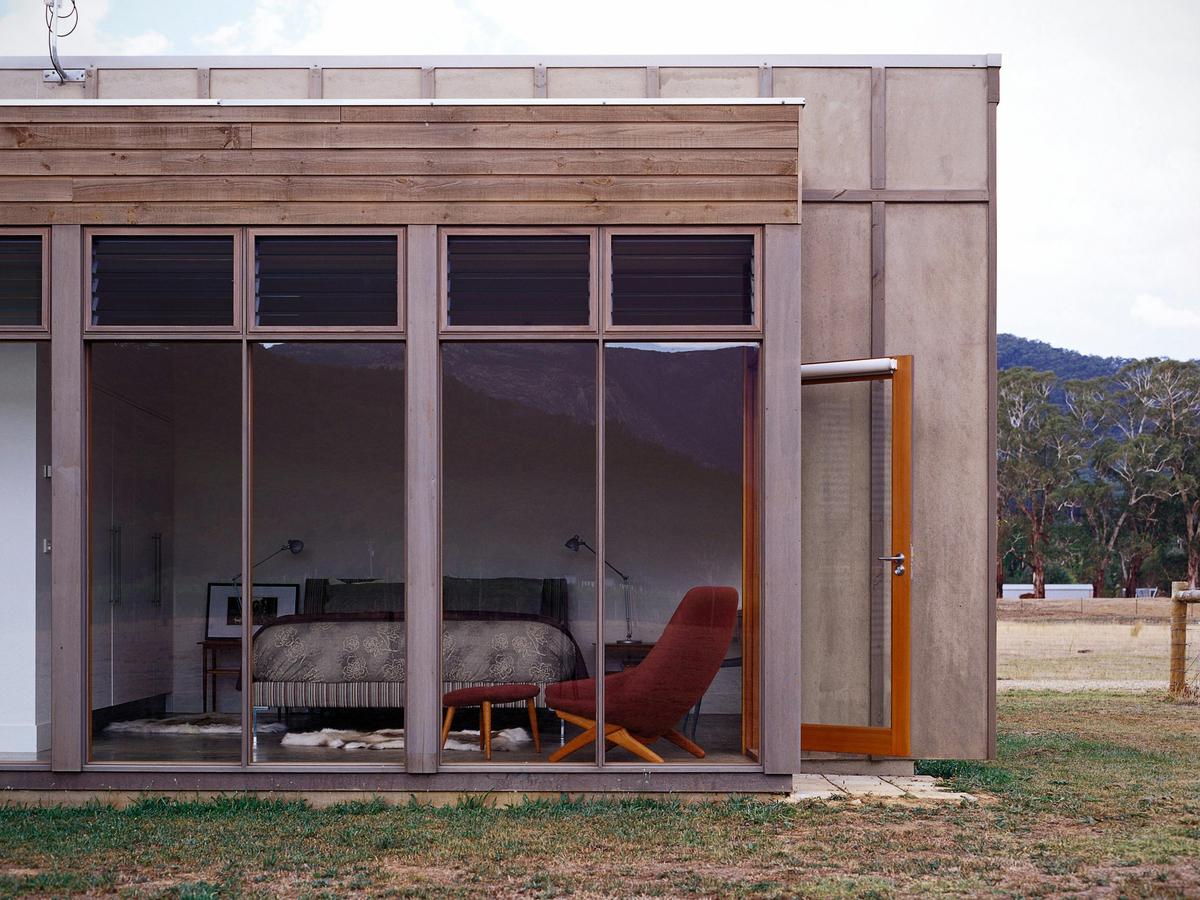 main bedroom with glass wall