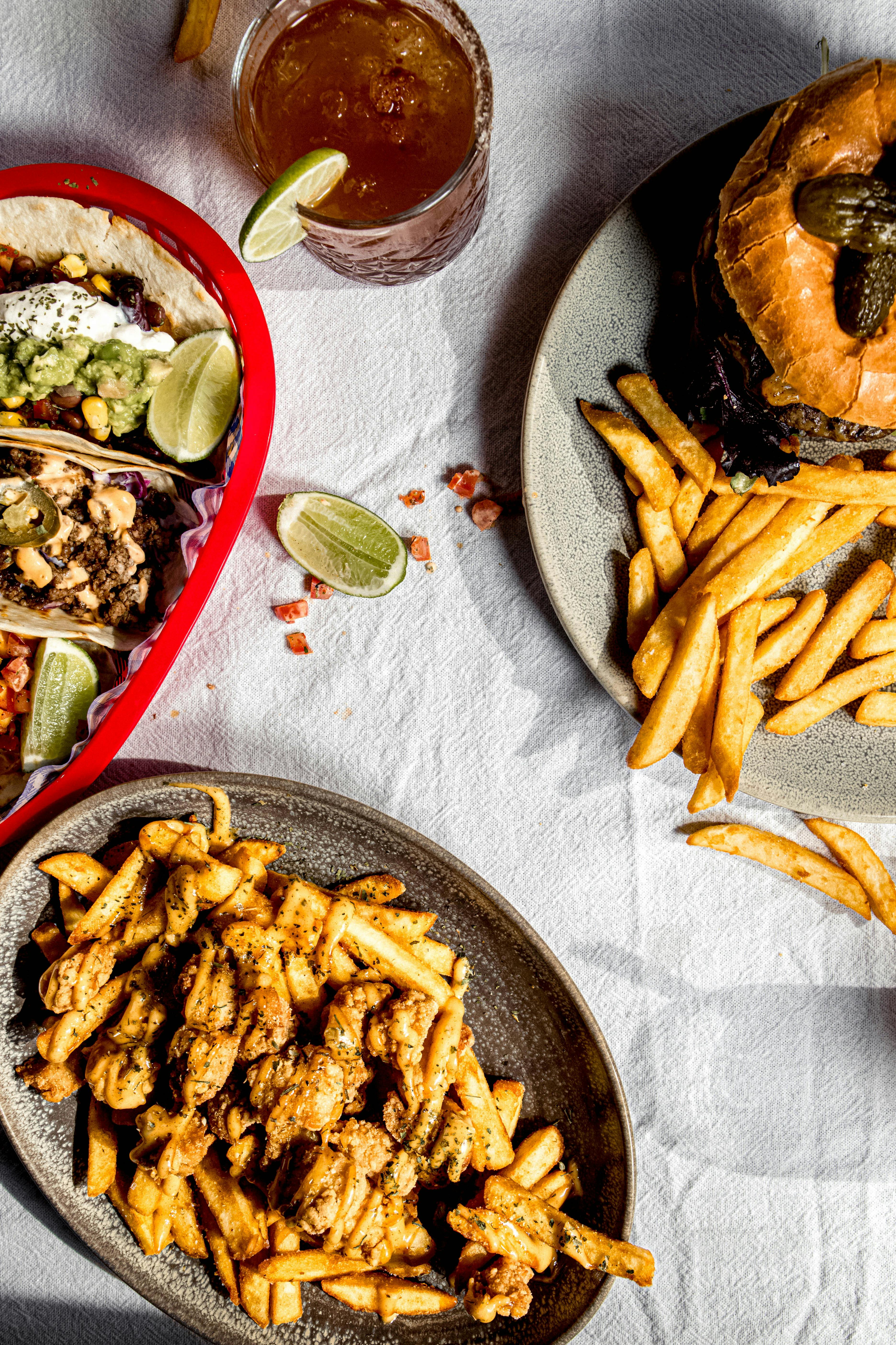 The George Hotel Promotional Menu. Big Burgers, Loaded Fries & Taco's.