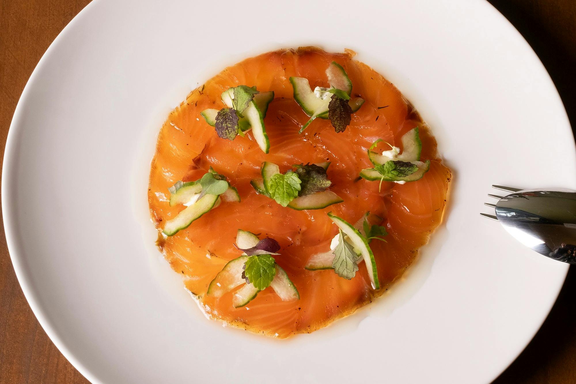 Lemon Myrtle And Tea Cured Salmon, Pickled Cucumber, Dill Crème Fraîché, Picked Herbs, Lemon Oil