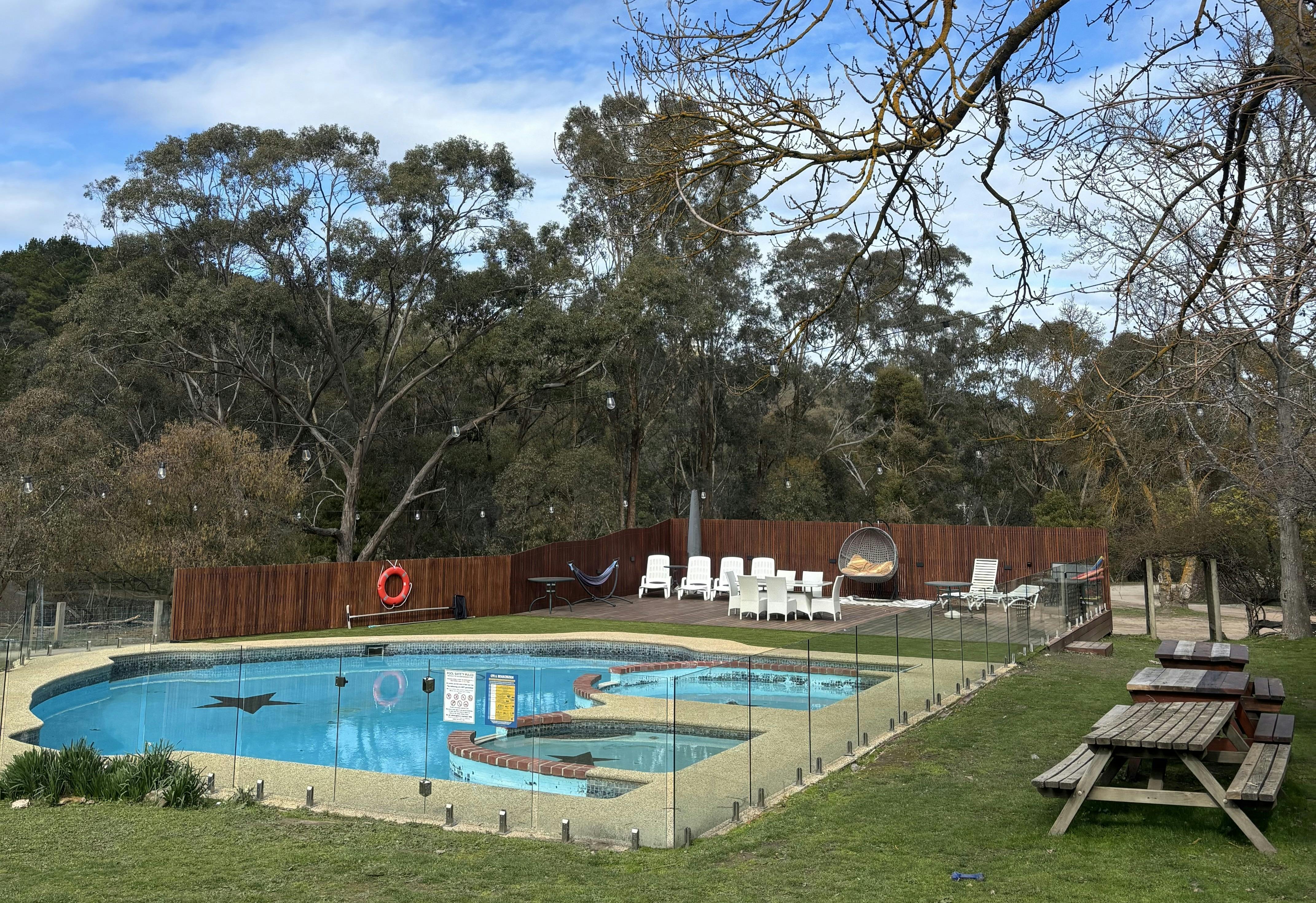 Unwind in our sparkling outdoor pool, surrounded by the tranquility of nature.