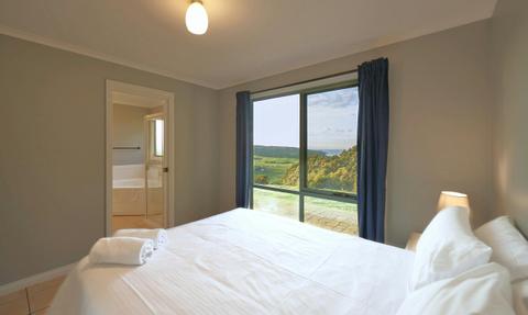 Spacious master bedroom with stunning views