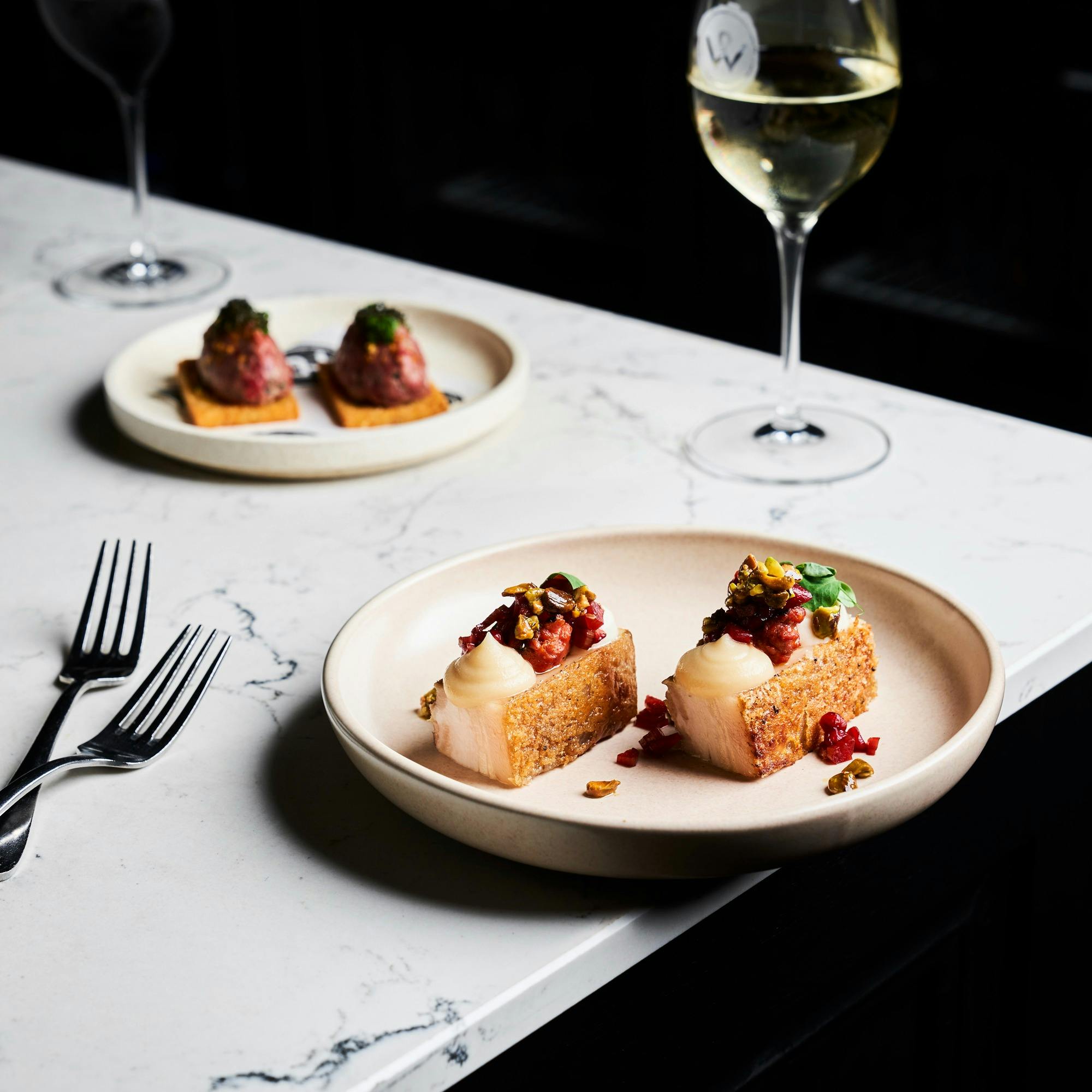 McIvor Farm pork belly, roasted apple, chorizo, cauliflower, pomegranate, pistachio