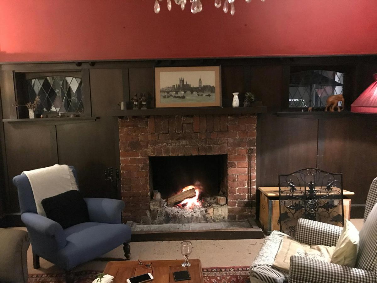 Relax in the lounge at cosy Karbeethong Lodge