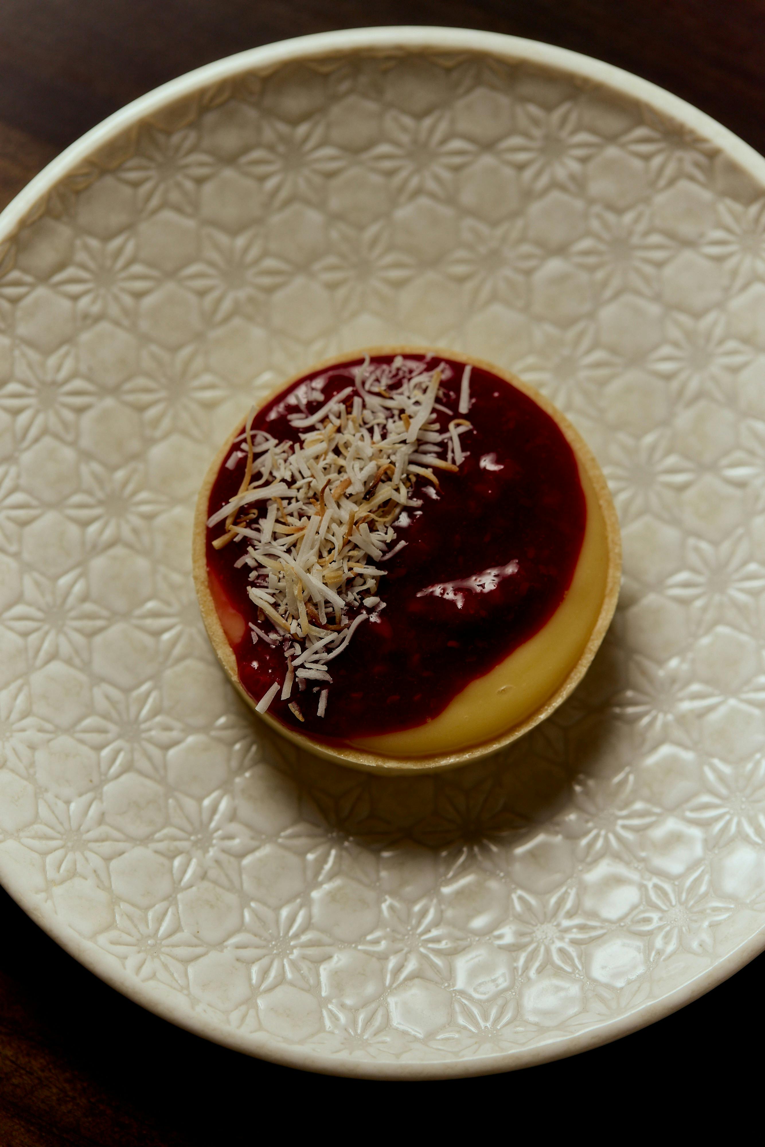 Yuzu tart with Bubbly Shiraz macerated berries