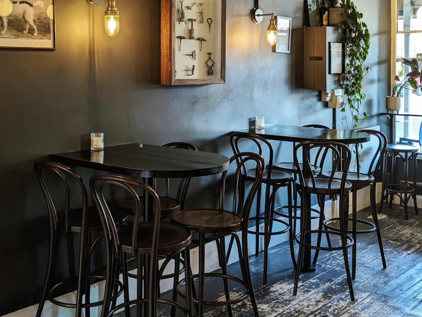 Step inside The Social—where old-world charm meets modern elegance.  Pull up a stool, pour a glass.