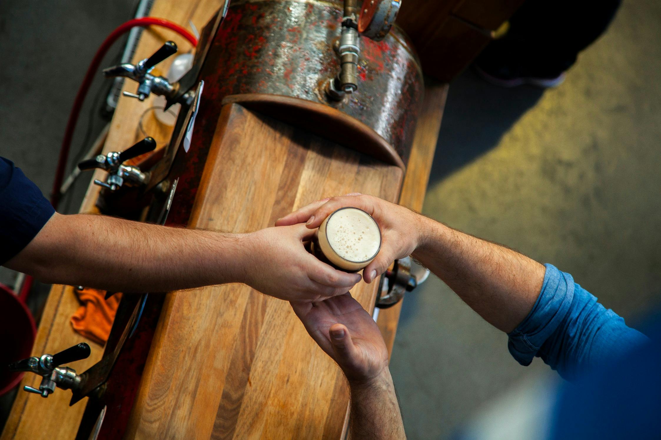 Serving beer over our bar.