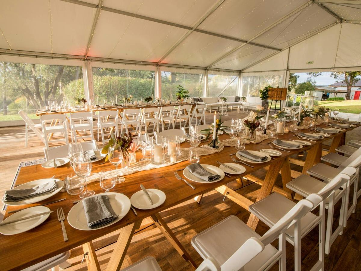 Marquee with tables and chairs set up