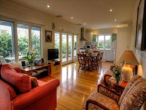 A spacious light filled open plan living dining area