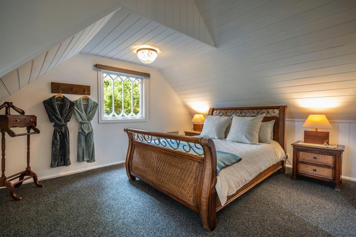 Your Bedroom Retreat, complete with ensuite bathroom and spa overlooking forest balcony.