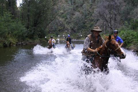 Traversing the Howqua River on horseback