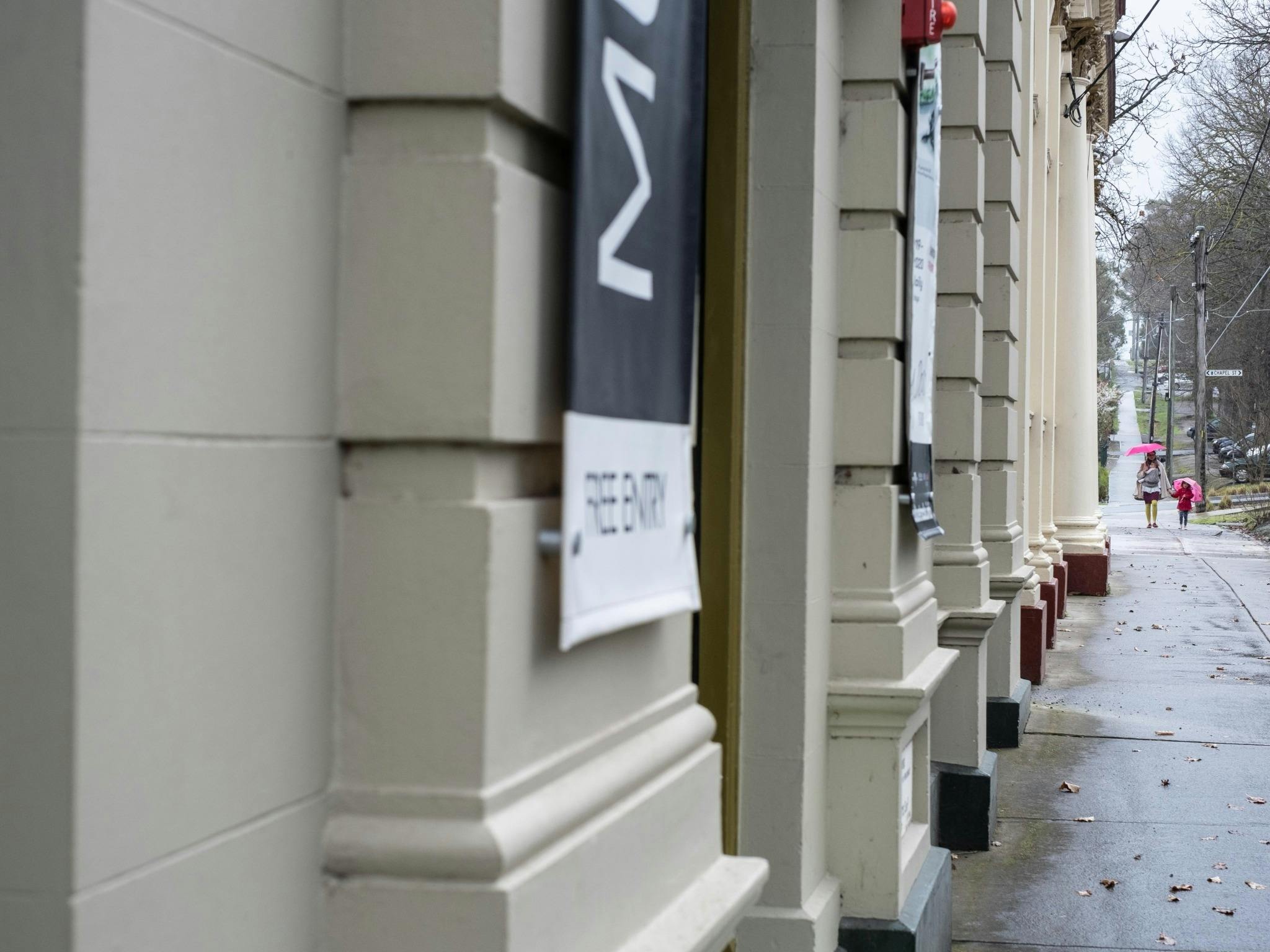 The front of the Museum, with a family approaching the doors
