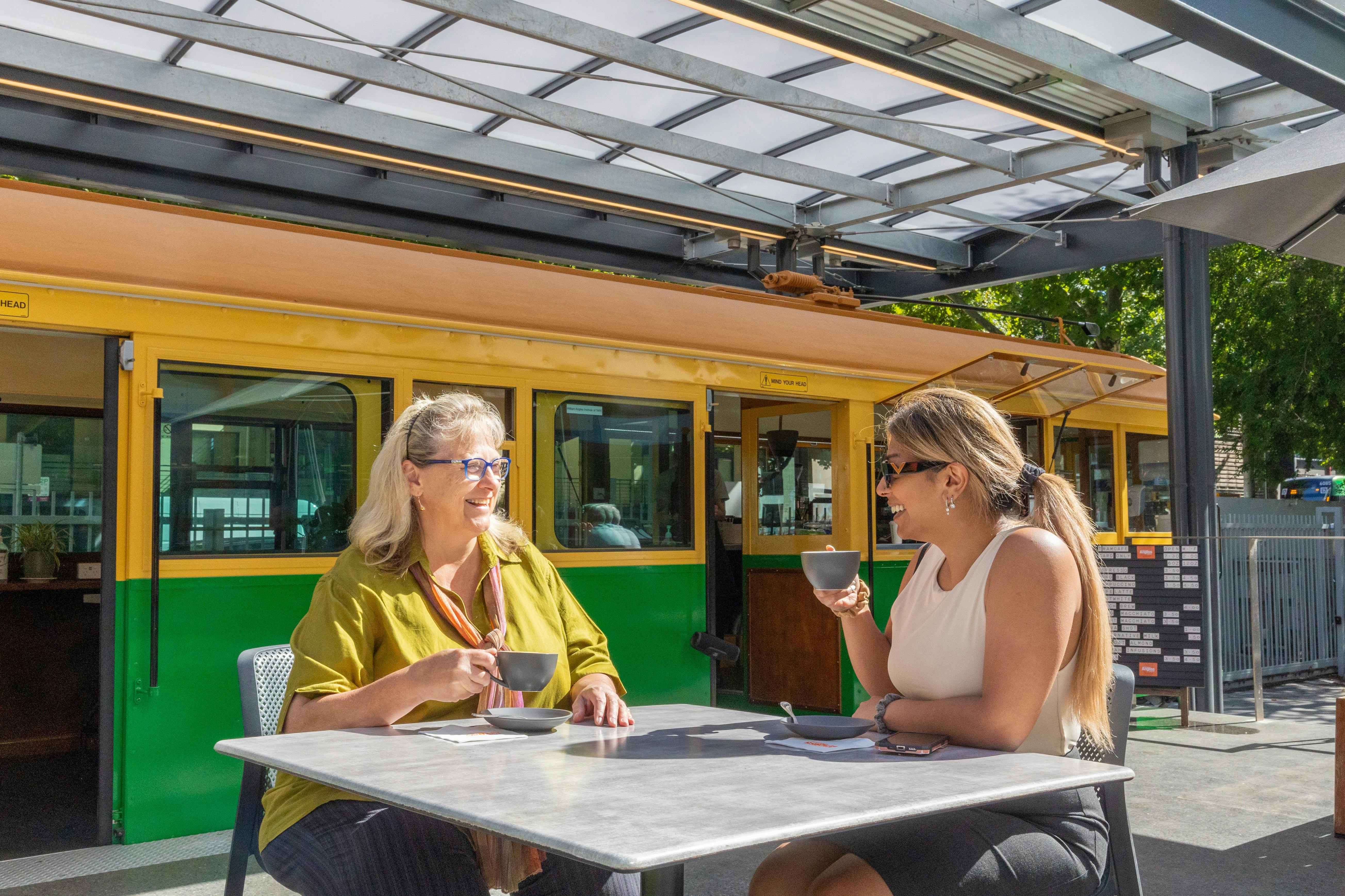 Patrons enjoying coffee outside the Tram Café