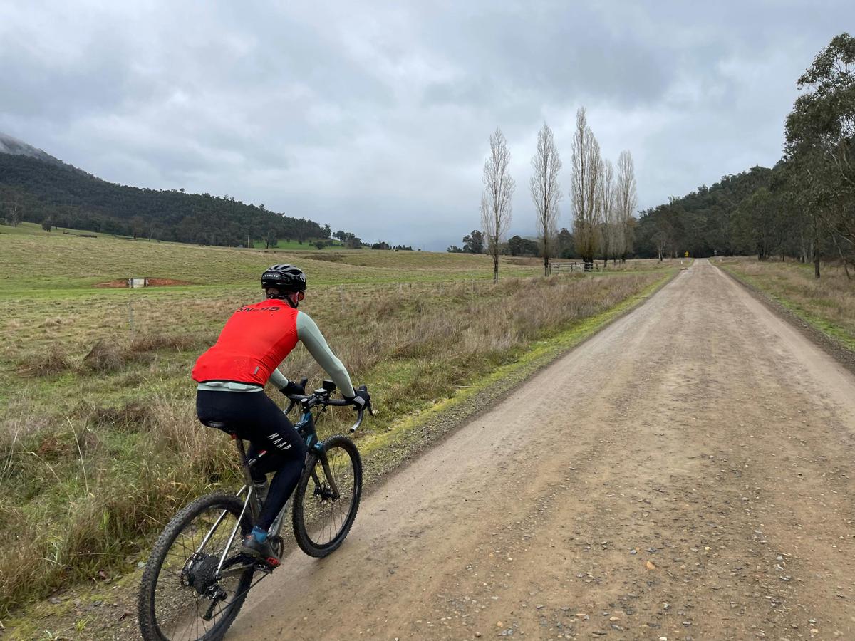 Cyclist on gravel road