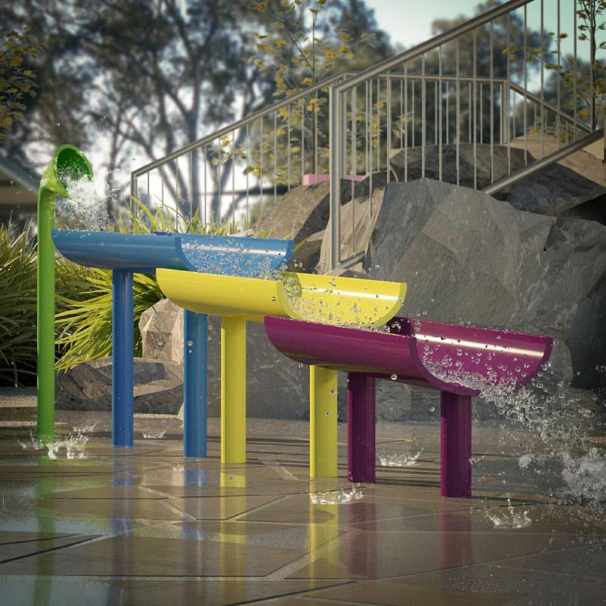Water splashing down splash park equipment.
