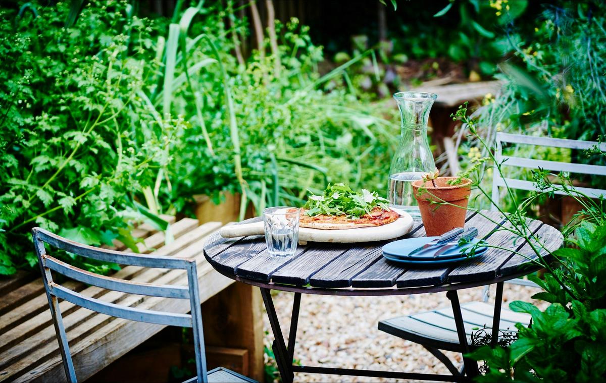 little kitchen garden thrives in the warmer months with all sorts of herbs, vegetables and flowers