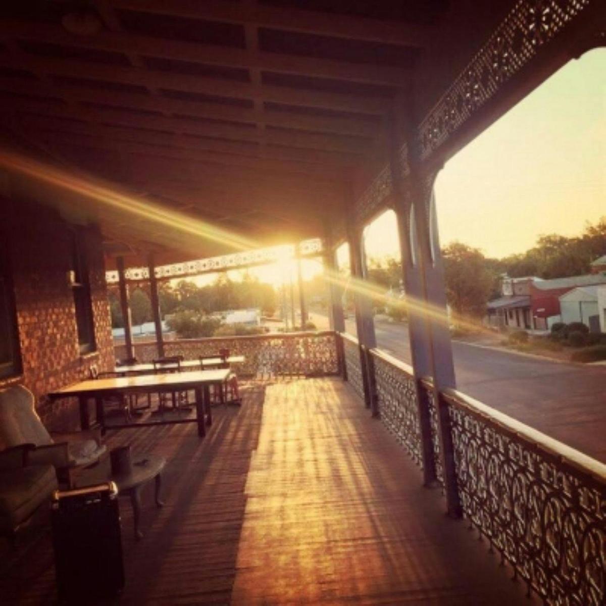 Looking at the sun setting from the timber verandah of the hotel