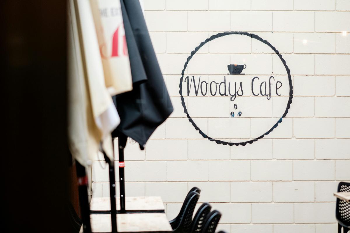 Coat rack with Cafe signage