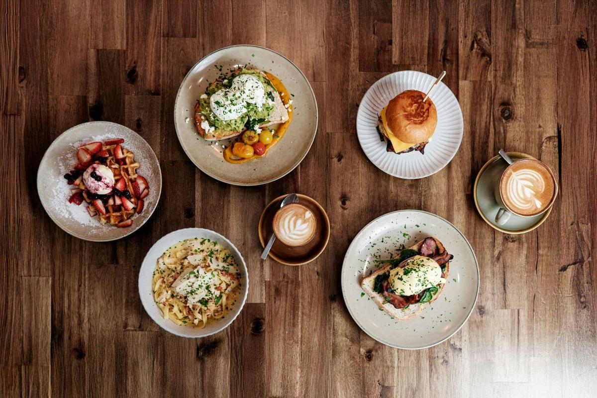 Plates of food on a wooden table