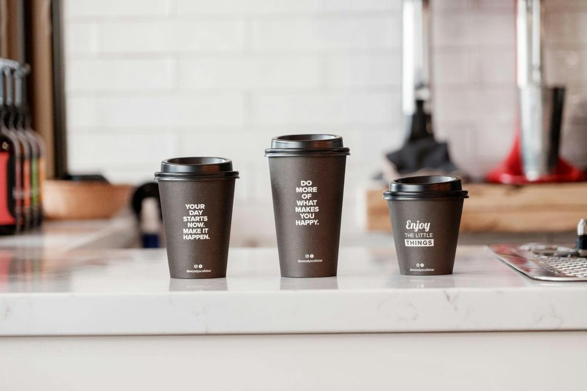 3 different sized takeaway cups on a counter