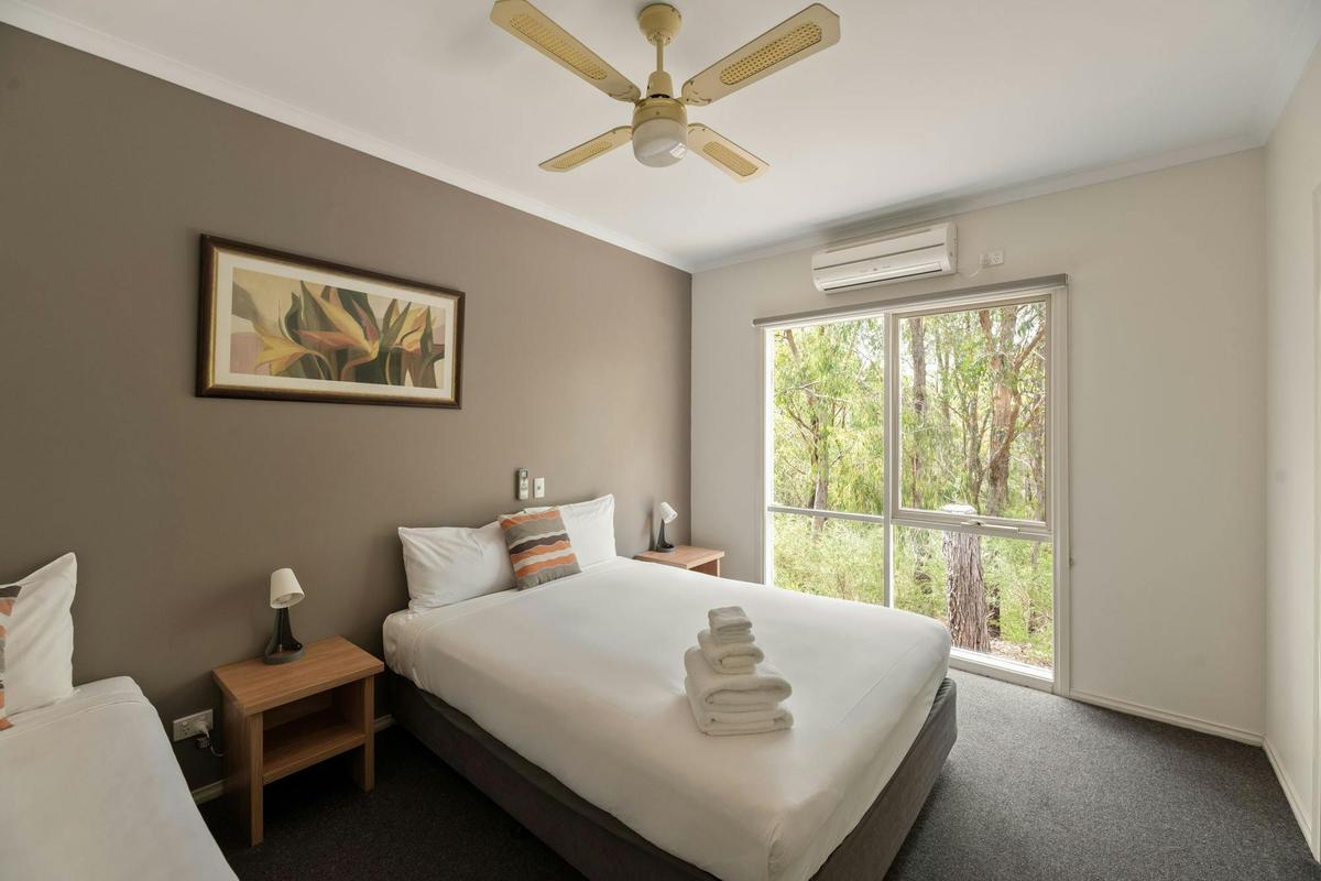 En-suite room with bushland views and natural light