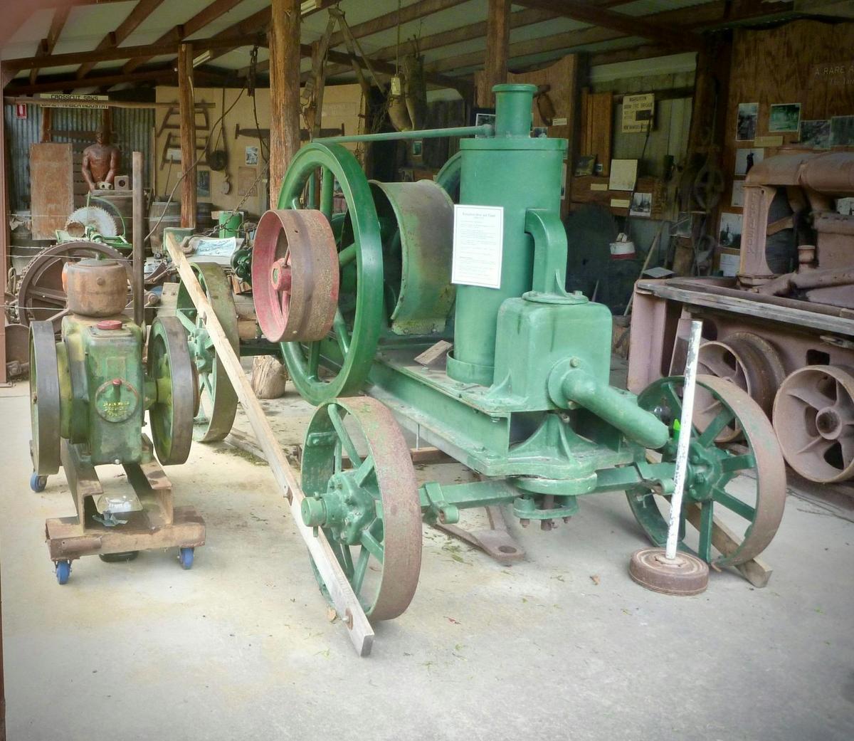 Stationary engines and wood shed, featuring artifacts from the local logging industry