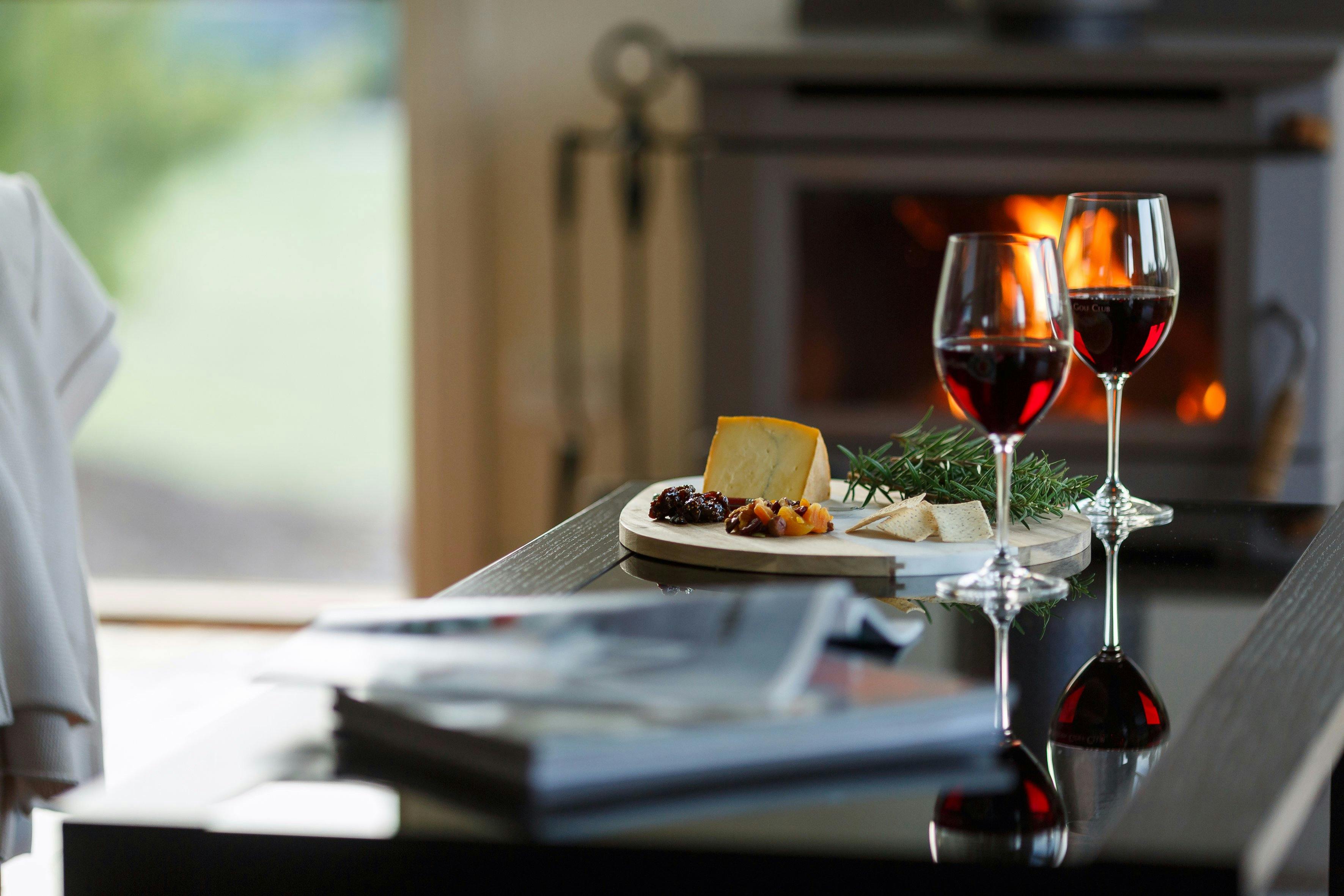 Cheese and wine by your personal fireplace