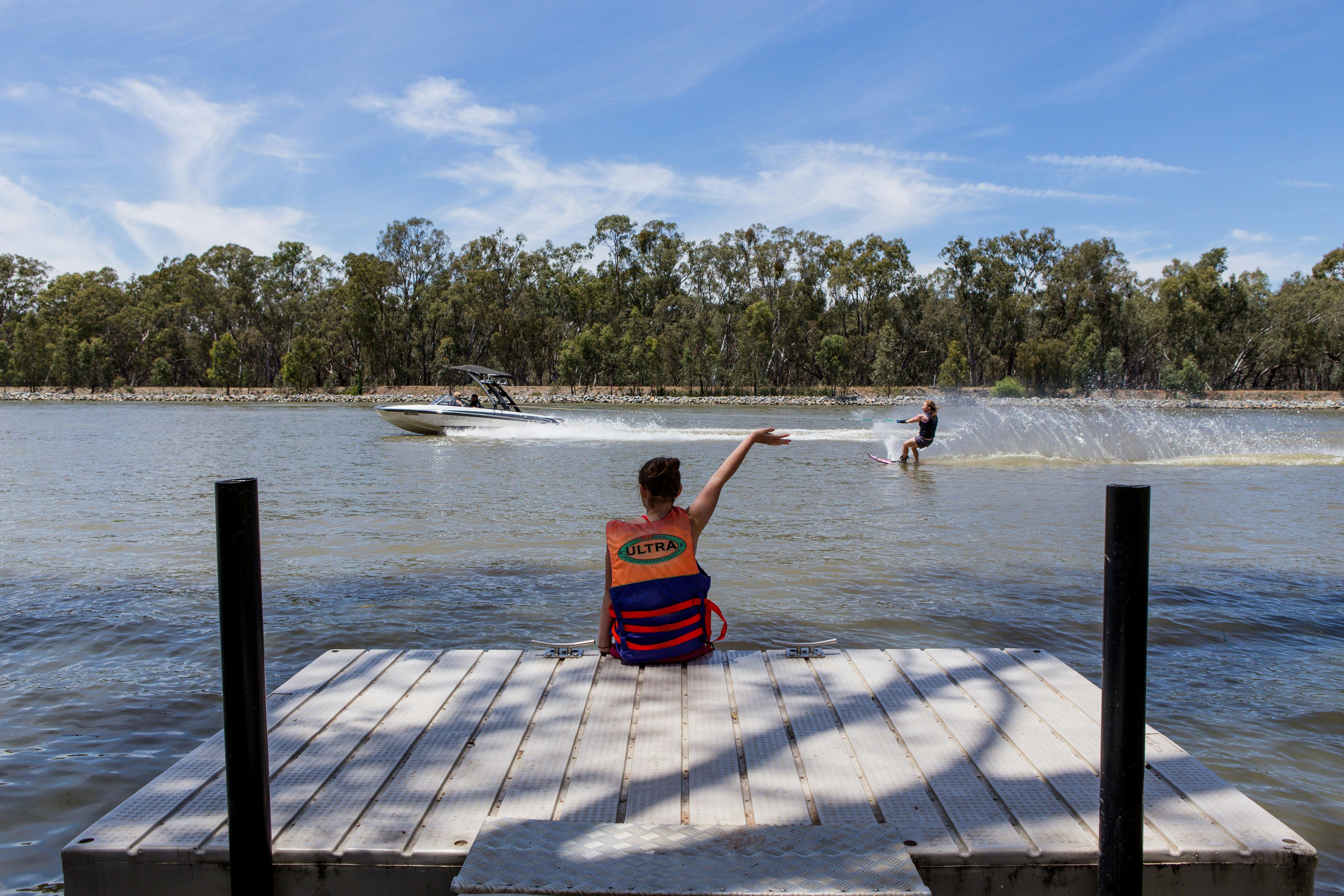 Waving at waterskier at Lake Talbot