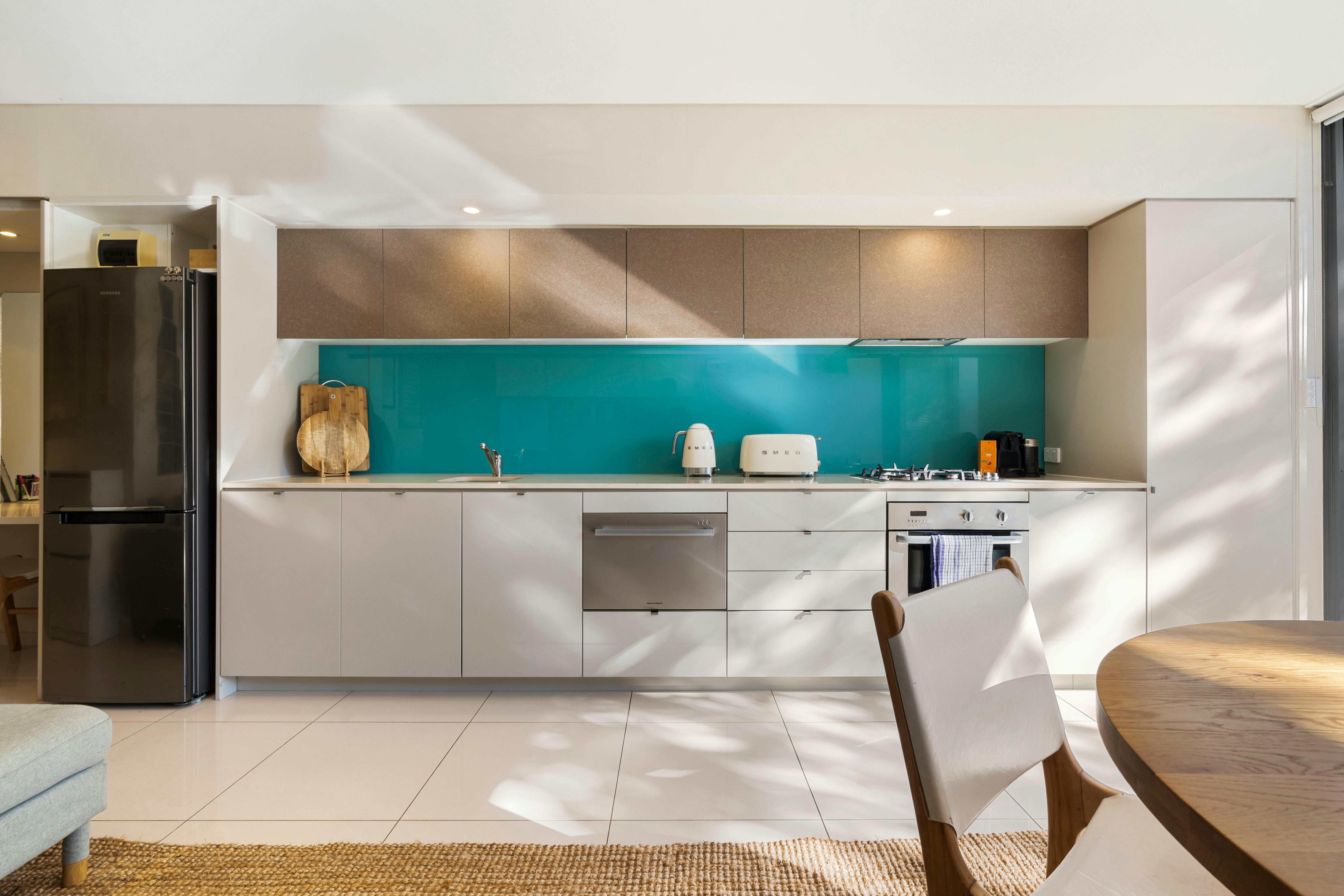 Bright and airy open-plan kitchen and living area, with a stylish private courtyard.