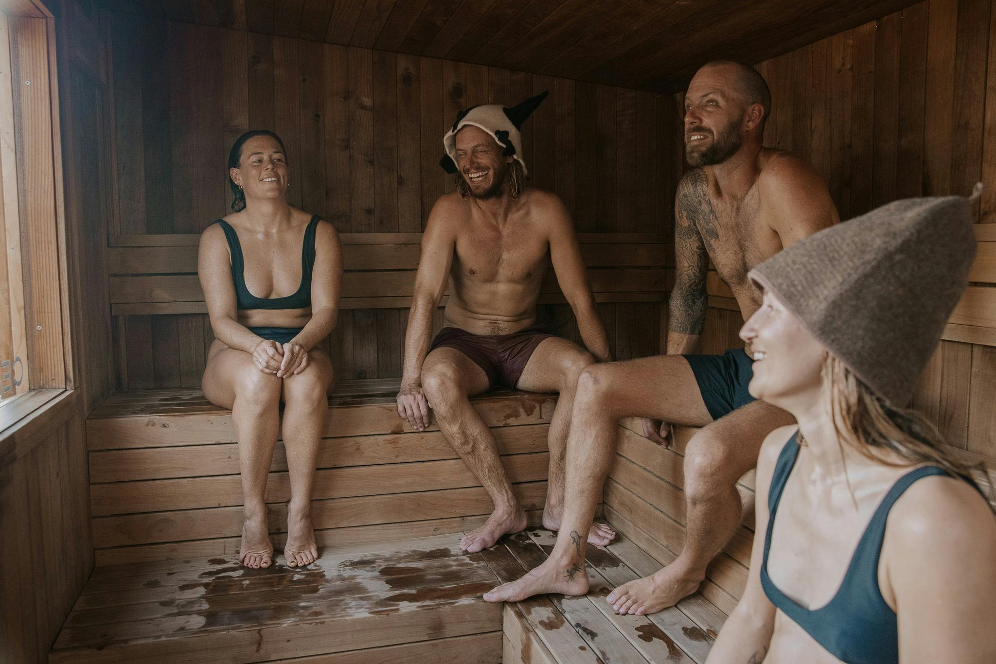 Friends enjoying a beach sauna in Manly sydney