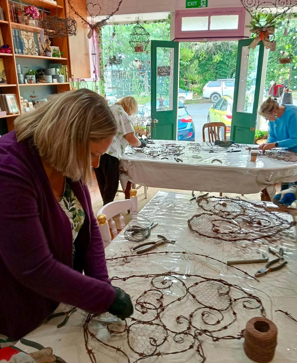 Our lovely workshop space with guests in the process of making their Hearts of Wire.